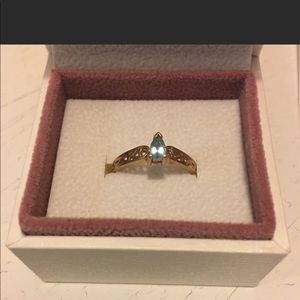 Small blue topaz gold ring